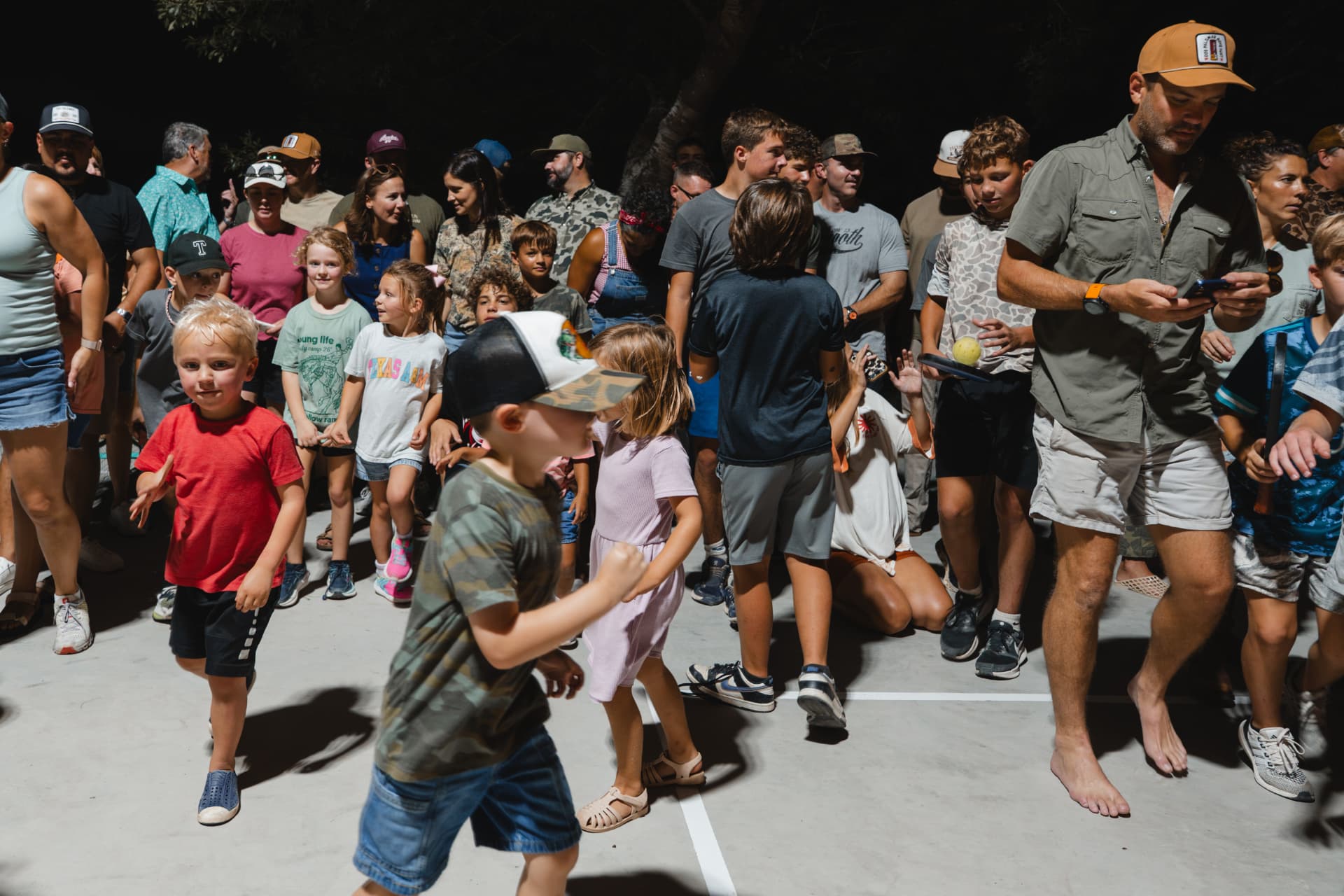 Families and kids gathered on the night court