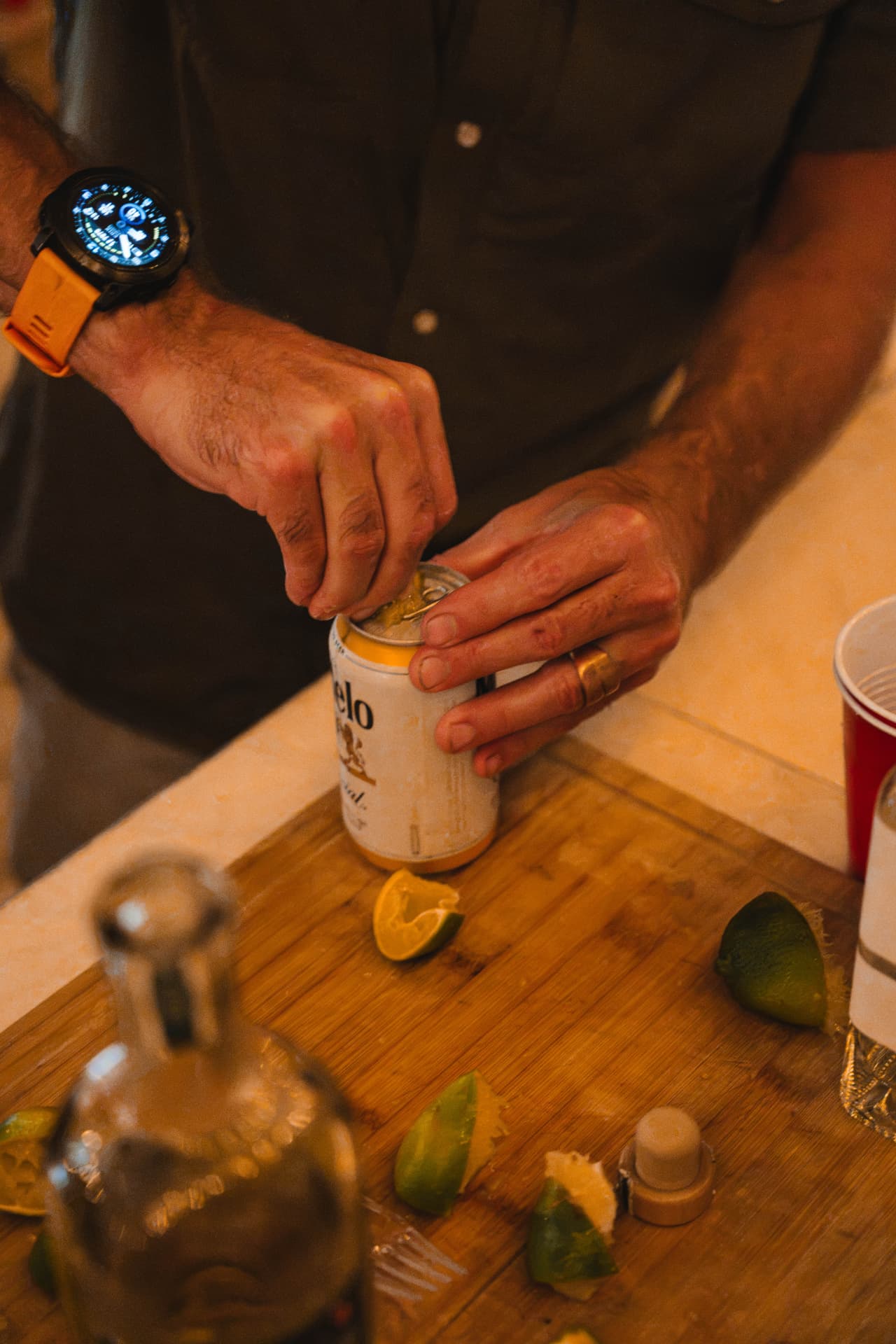 Dropping a lime wedge into a cold Modelo