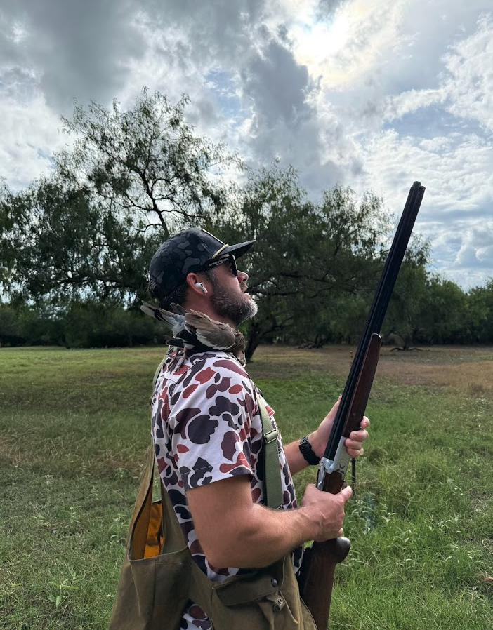 Hunter scanning the South Texas sky